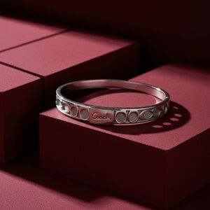 Coach Silver-Tone Signature C Cutout Slip-On Bangle Bracelet - Classic Logo